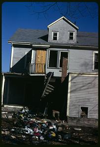 A house with boarded up windows