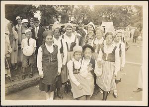 Costumed group, street fair