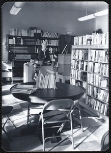 Newton Free Library, Newton, MA. Branch library. Oak Hill - Stein Circle. Pat Daley at circulation desk