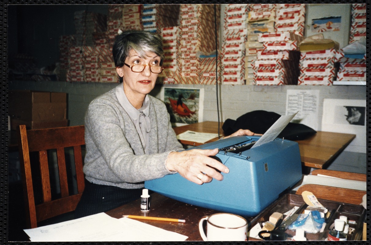 Newton Free Library, Newton, MA. Staff & trustees. Woman at typewriter - Social Services