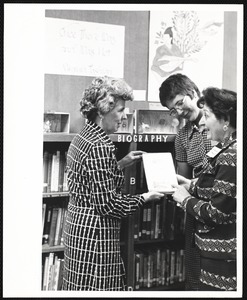 Newton Free Library, Newton, MA. Staff & trustees. Virginia Tashjian with her book