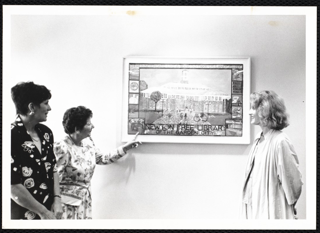 Newton Free Library, Newton, MA. Communications & Programs Office. Virginia Tashjian admires gift (2 women)