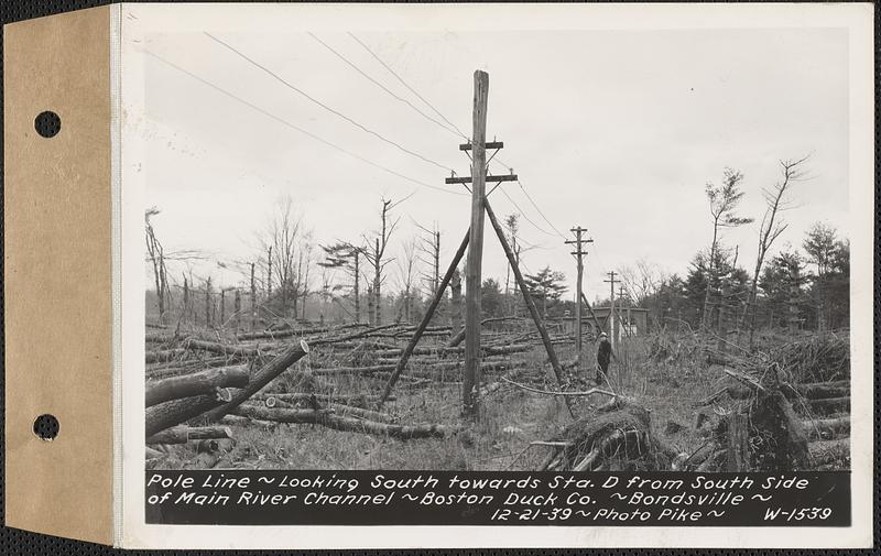 Pole line, looking south towards Station D from south side of main river channel, Boston Duck Co., Bondsville, Palmer, Mass., Dec. 21, 1939