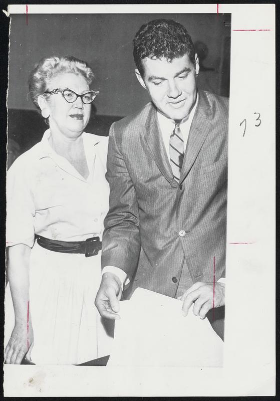 Mrs. Florence Aadland was convicted yesterday in Los Angeles of contributing to the delinquency of her 17-year-old daughter, Beverly. Judge returned verdict after studying photographs of drinking party at the Aadland apartment. With Mrs. Aadland is her attorney, Marvin Mitchelson.