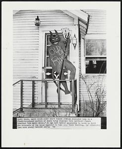 No Doubt Who's taking over- An evacuated home in a flood-threatened section of Omaha today displays this carboard figure labelled "Old Devil River." It was left behind apparently to leave no doubt who occupants of the house expected to take over their dwelling.