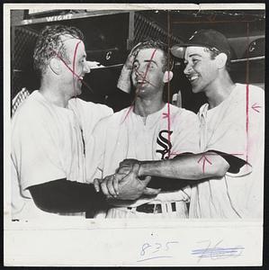 Pitching Miracle in this era of jet-propelled ball was accomplished by White Sox pitcher Walt Pierce (center) who hurled a one-hitter to shut out the Yankees, 5-0, yesterday. Catcher Phil Masi (left), former Brave, and Shortstop Chico Carrasquel enthusiastically congratulate the young hurler.