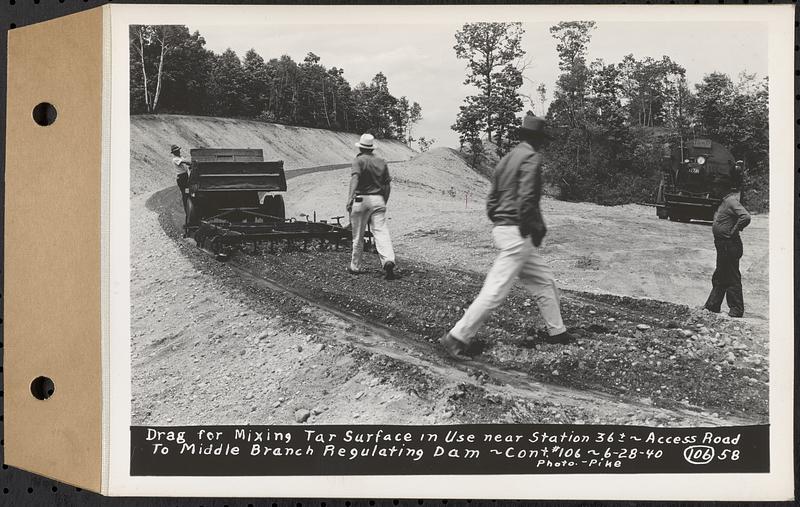 Contract No. 106, Improvement of Access Roads, Middle and East Branch Regulating Dams, and Quabbin Reservoir Area, Hardwick, Petersham, New Salem, Belchertown, drag for mixing tar surface in use near Sta. 36+, access road to Middle Branch Regulating Dam, Belchertown, Mass., Jun. 28, 1940