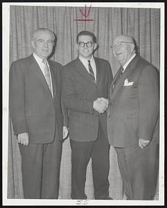 Swede Nelson Award winner, Boston University freshman Tommy Salvo being congratulated last night at Hotel Somerset by Nils V. "Swede" Nelson (right) for whom the award is named, and D. Leo Daley, selection group head.