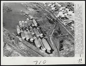 Strike-Bound Ore Carriers--These 18 iron ore freighters are tied up in the Milwaukee municipal mooring basin awaiting the end of the steel and coal strikes. They have been tied up for more than two weeks, and among them contain about 170,000 tons of ore.