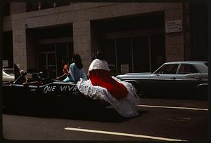 People sitting on car in the 1976 Festival Puertorriqueño