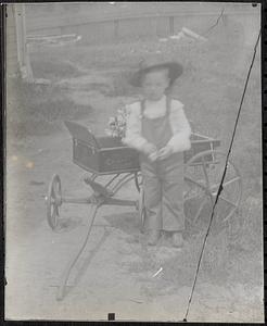 Boy and toy wagon