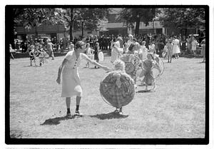 Group holding circular emblems