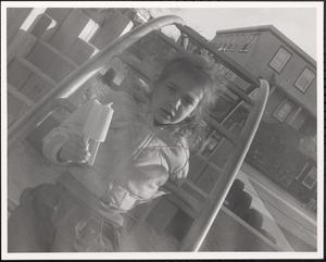 Girl on the playground with a popsicle