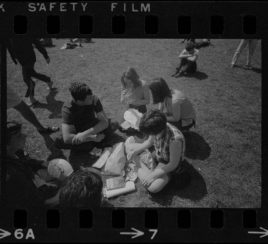 Hippies on the Boston Common playing guitar