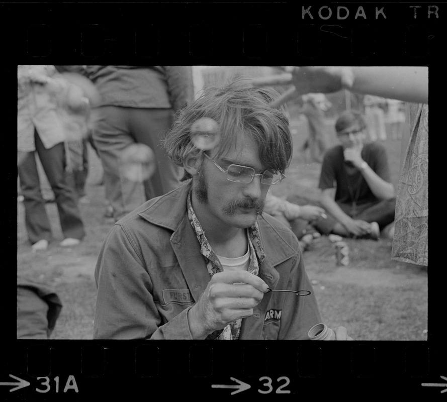 Hippie on the Boston Common blowing bubbles