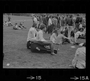 Hippies on the Boston Common sitting on guitar cases