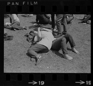 Hippies on the Boston Common embracing