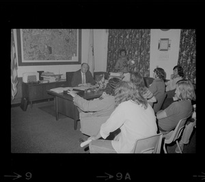 Mayor of Woburn, Edward Gill, meets with a youth organization to discuss recent tensions