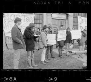 Protestors outside the Harvard building occupied by women's liberationists