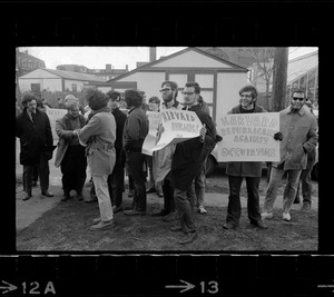 Protestors outside the Harvard building occupied by women's liberationists