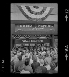 Woolworth executive speaking at opening day
