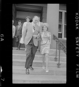 Woburn ex-Mayor Edward F. Gill and his wife seen leaving Middlesex County Courthouse
