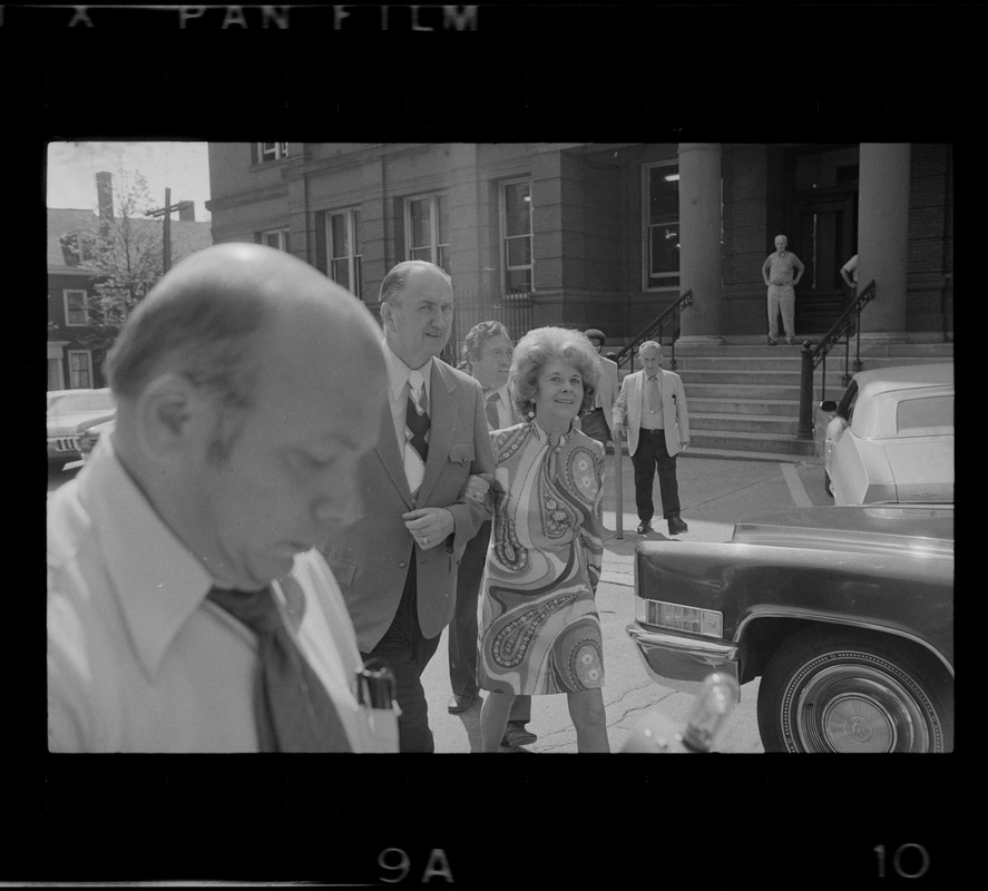 Woburn ex-Mayor Edward F. Gill and his wife seen leaving Middlesex County Courthouse