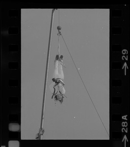 Hanging for the fun of it - Norman Bigelow shows off his Houdini talents above Boston College
