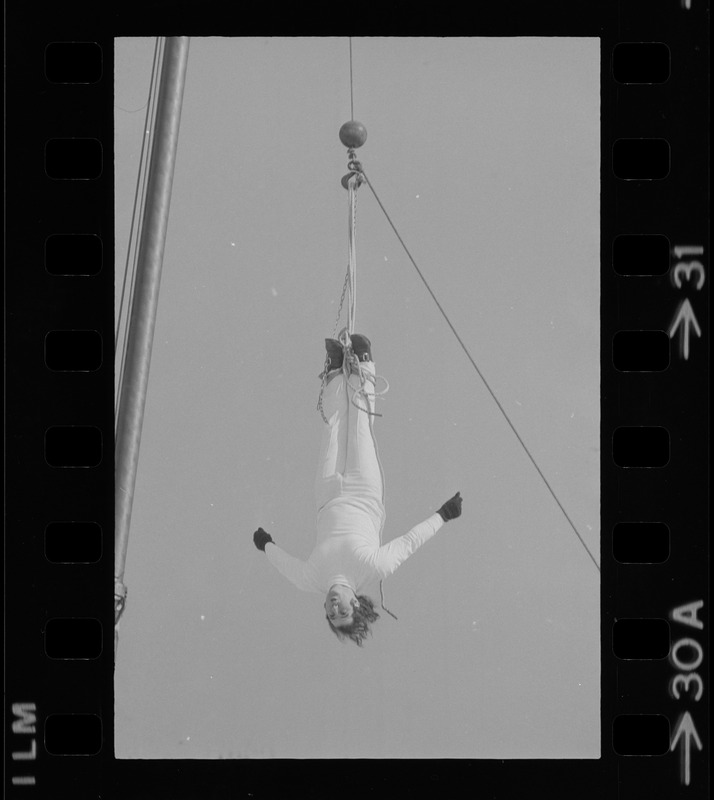 Hanging for the fun of it - Norman Bigelow shows off his Houdini talents above Boston College