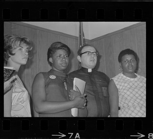 Mrs. Roberta O'Neil, left, and Father George Spagnolia, center, welfare rights activists