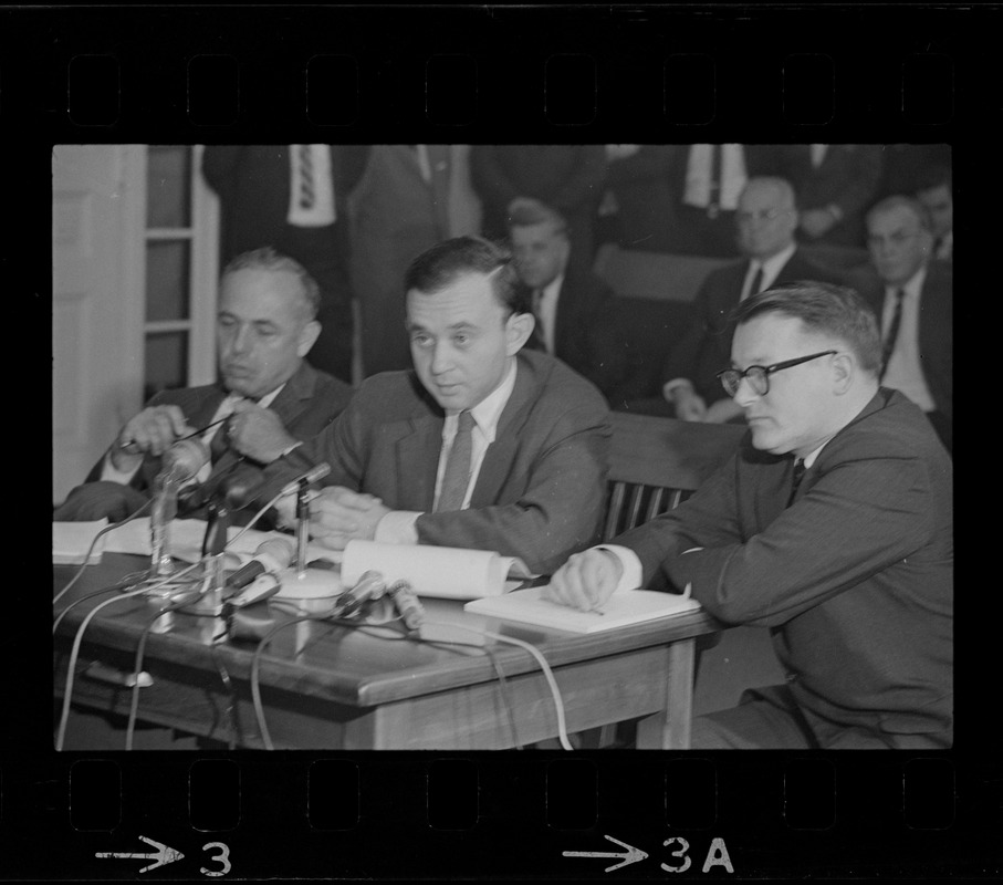 Frederick Wiseman, 'Titicut' producer, flanked by his attorneys is James St. Clair (left), and Blair L. Perry, at hearing before State Commission on Mental Health