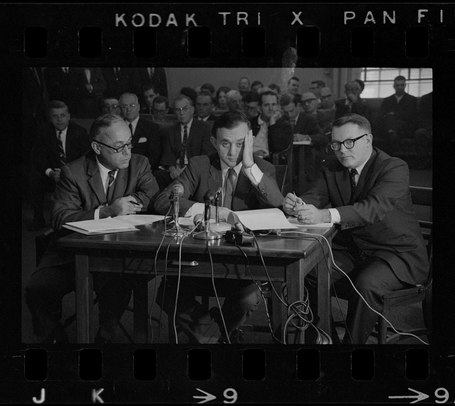 Frederick Wiseman, 'Titicut' producer, flanked by his attorneys is James St. Clair (left), and Blair L. Perry, at hearing before State Commission on Mental Health