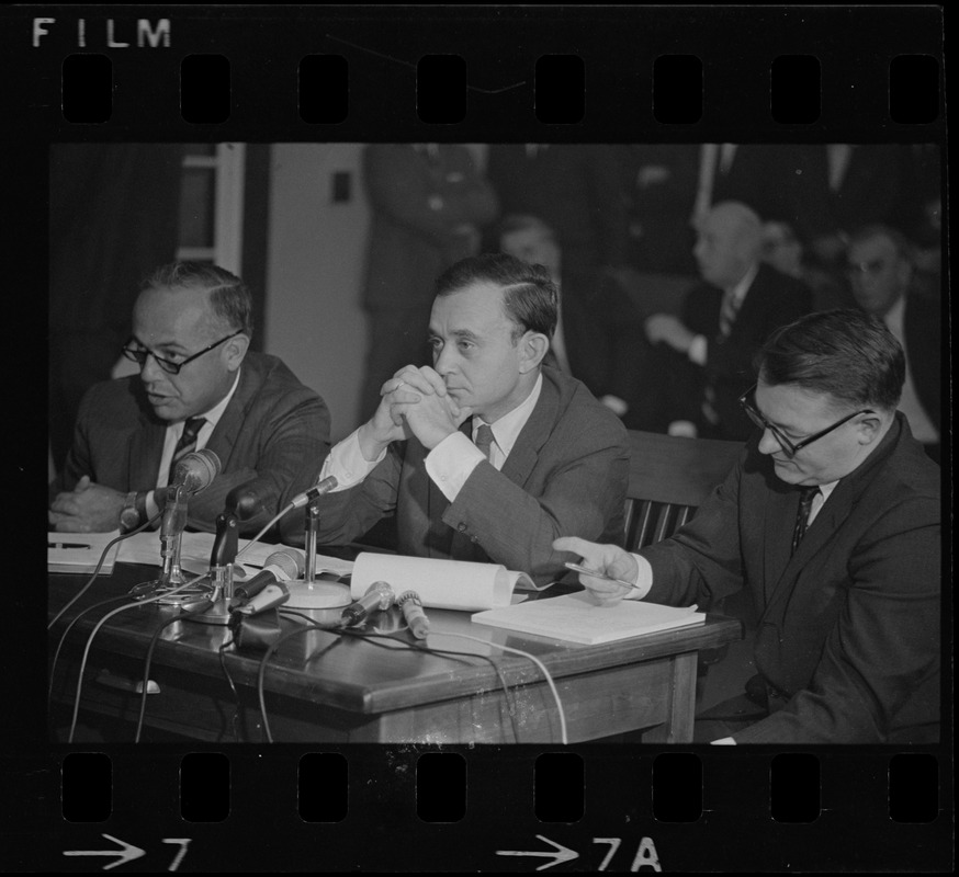 Frederick Wiseman, 'Titicut' producer, flanked by his attorneys is James St. Clair (left), and Blair L. Perry, at hearing before State Commission on Mental Health