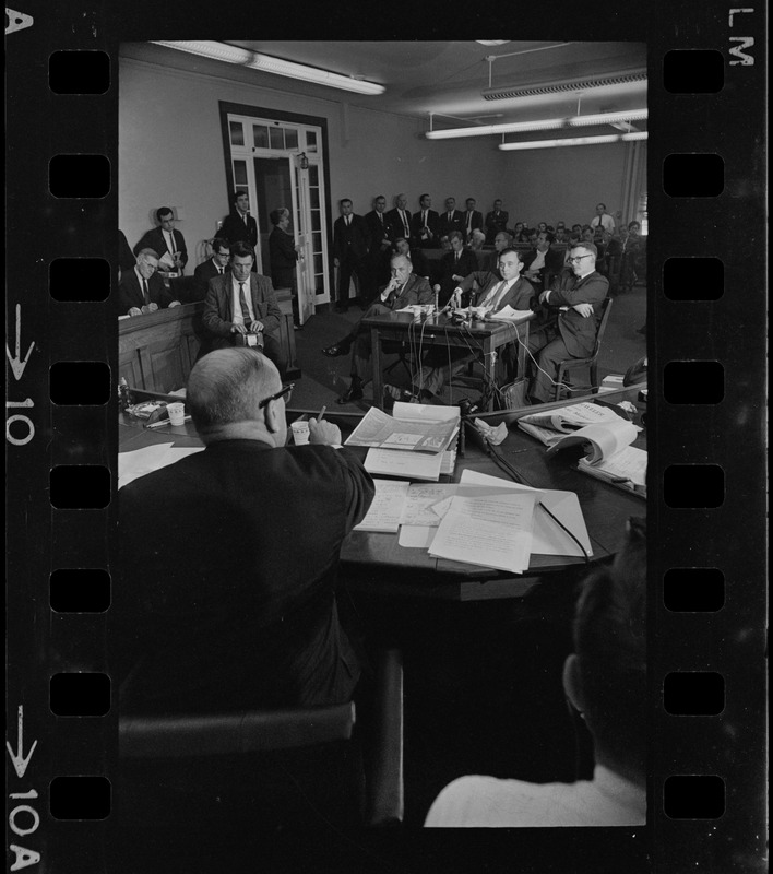 Frederick Wiseman, 'Titicut' producer, flanked by his attorneys is James St. Clair (left), and Blair L. Perry, at hearing before State Commission on Mental Health