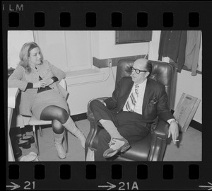 Phil Silvers speaking with a woman while he is in Boston to perform in the comedy "How the Other Half Loves" at the Wilbur Theater