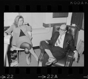 Phil Silvers speaking with a woman while he is in Boston to perform in the comedy "How the Other Half Loves" at the Wilbur Theater