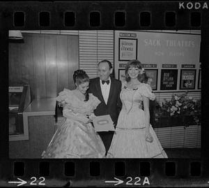 Ben Sack, theatre owner, seen with group at showing of "Gone with the Wind" film at Gary Theatre in the Back Bay