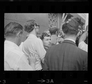 Josef Mlot-Mroz seen in the middle of crowd of protesters after the sentencing of Dr. Spock and others for draft conspiracy charges
