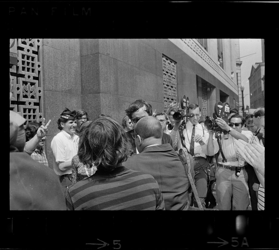 Michael Ferber, Harvard graduate student, surrounded by crowds outside ...