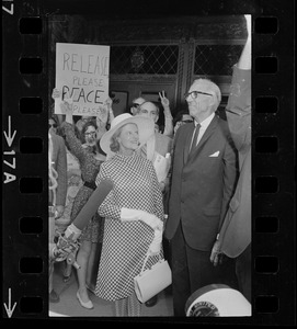 Dr. Benjamin Spock, right, and his wife, Jane, left, outside Federal Courthouse for sentencing on draft conspiracy charges