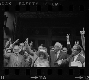 Dr. Benjamin Spock and Jane Spock, center, and other defendants outside Federal Courthouse for sentencing on draft conspiracy charges