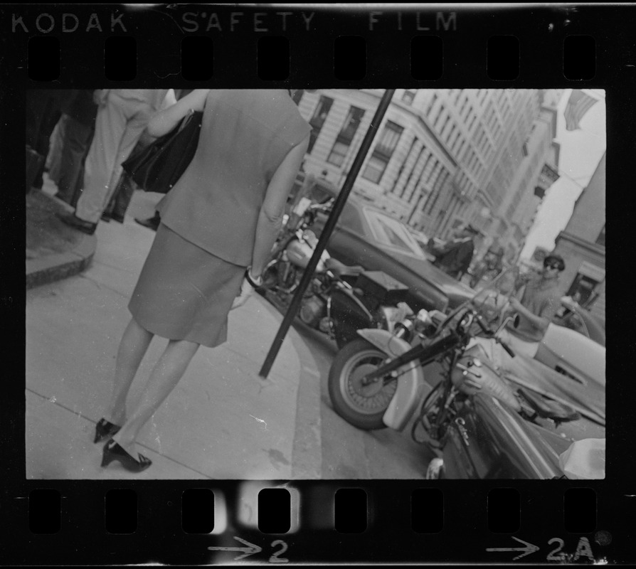 View of street and parked cars during protest outside the Federal Courthouse after the sentencing of Dr. Spock and others for draft conspiracy charges