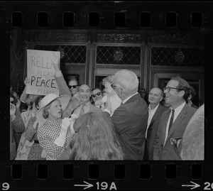 Dr. Benjamin Spock and Jane Spock, center, and other defendants outside Federal Courthouse for sentencing on draft conspiracy charges