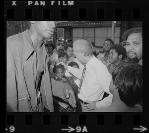 Mayor White seen with residents of Blackstone Park section of South End after Puerto Rican Day disturbances