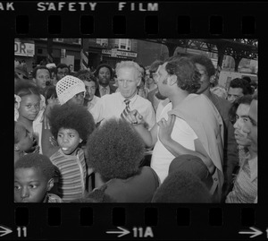 Mayor White seen with residents of Blackstone Park section of South End after Puerto Rican Day disturbances