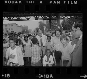 Mayor White seen with residents of Blackstone Park section of South End after Puerto Rican Day disturbances