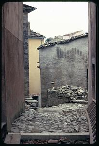 Cobblestone roads between buildings, Roccasicura, Italy