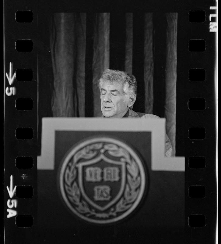 Leonard Bernstein rehearses a speech at Harvard's Sanders Theatre, Cambridge