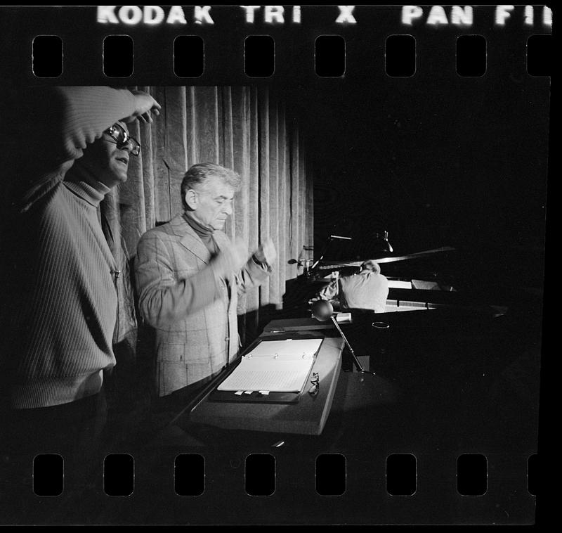 Leonard Bernstein rehearses a speech at Harvard's Sanders Theatre, Cambridge