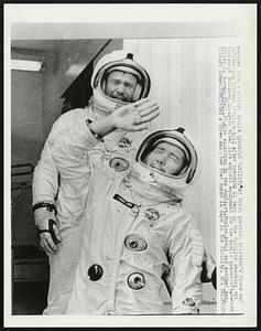 Emerges from a special Apollo checkout facility at North American Aviation's Space and Information Systems Division 4/12 after spending 14 days in the facility checking out equipment designed to check vital life support equipment for the Apollo spacecraft. Behind Moyles is Norman Abell, 37, also squinting in the sunlight. Moyles, Abell and another man, Richard Erman, completed a three man crew that spent 14 days in the facility.